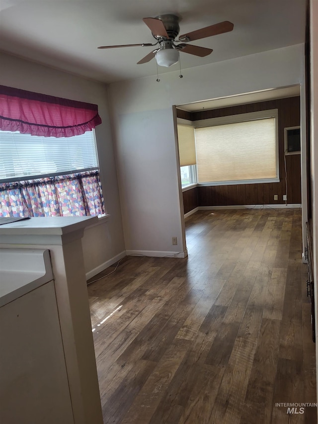 240 N D St, Orofino, ID 83544 - spare room with ceiling fan, baseboards, and dark wood-style floors