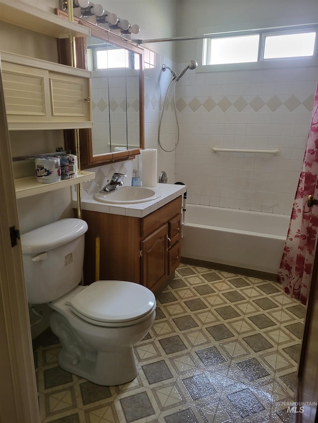 240 N D St, Orofino, ID 83544 - full bathroom with toilet, vanity, and shower / bath combination with curtain