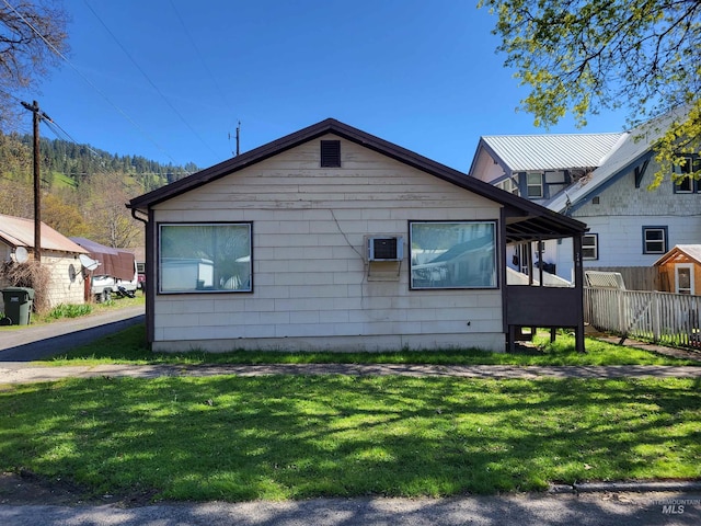 240 N D St, Orofino, ID 83544 - view of side of property with fence and a lawn