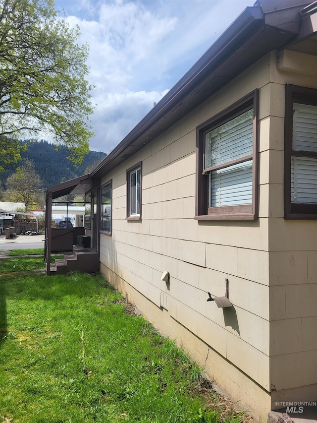 240 N D St, Orofino, ID 83544 - view of property exterior with a yard