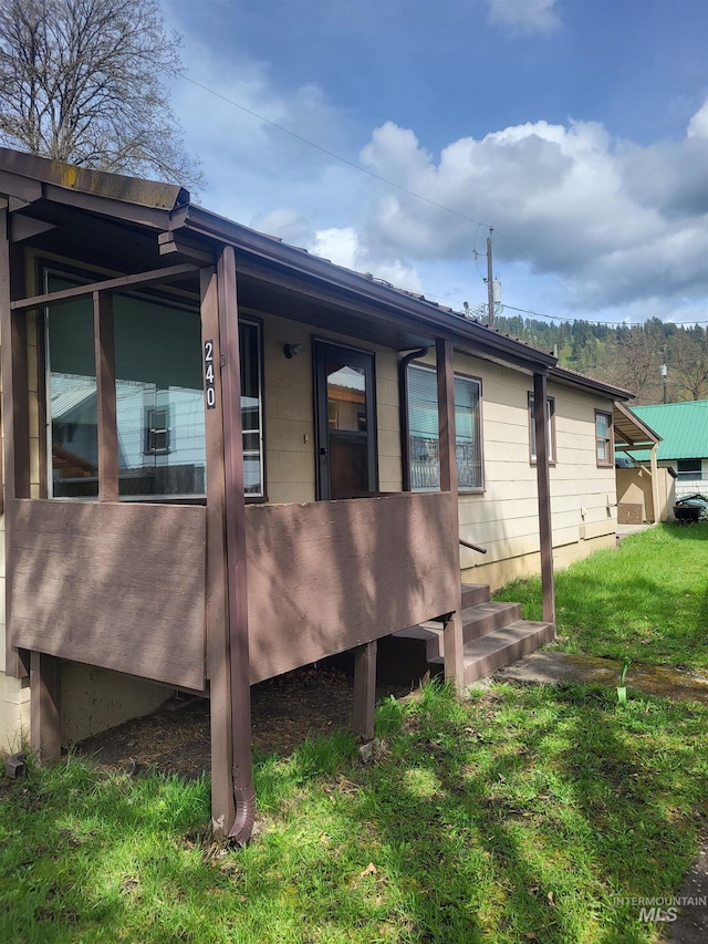 240 N D St, Orofino, ID 83544 - view of side of property with a lawn
