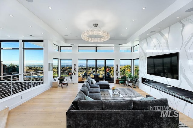 living room with light hardwood / wood-style flooring