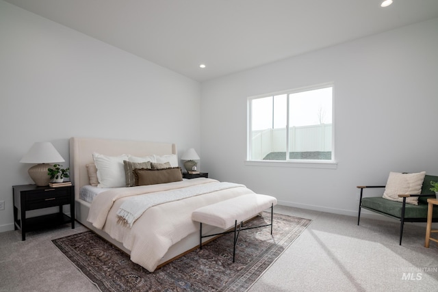 bedroom with baseboards, recessed lighting, and carpet