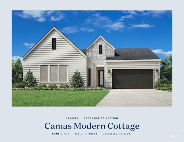 view of front facade featuring a front yard, concrete driveway, and an attached garage