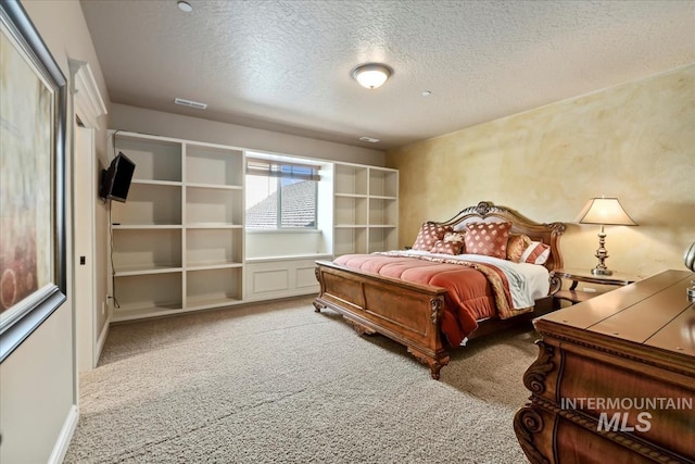 7406 Wild Horse Way, Nampa, ID 83686 - carpeted bedroom with visible vents and a textured ceiling