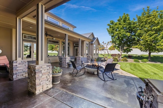 7406 Wild Horse Way, Nampa, ID 83686 - view of patio with a ceiling fan and a fire pit