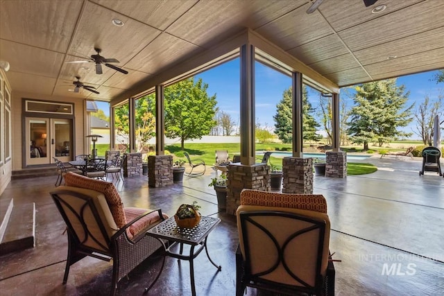 7406 Wild Horse Way, Nampa, ID 83686 - view of patio / terrace featuring ceiling fan, an outdoor pool, and french doors