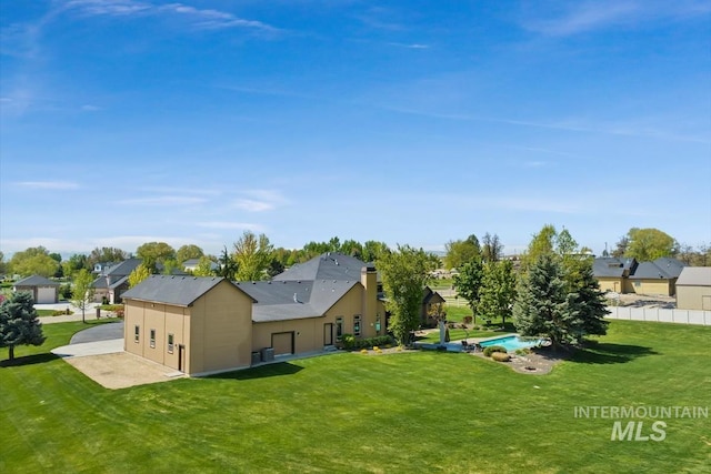 7406 Wild Horse Way, Nampa, ID 83686 - back of property featuring fence and a yard