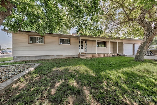 1040 N Pennsylvania Ave, Fruitland, ID 83619 - single story home featuring a garage and a front yard