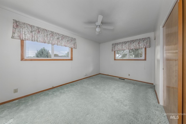 1040 N Pennsylvania Ave, Fruitland, ID 83619 - unfurnished bedroom with carpet floors, baseboards, and ceiling fan