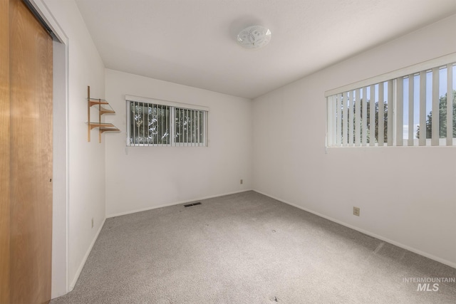 1040 N Pennsylvania Ave, Fruitland, ID 83619 - carpeted spare room featuring baseboards