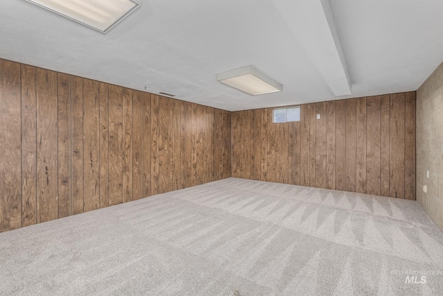 1040 N Pennsylvania Ave, Fruitland, ID 83619 - spare room featuring wood walls and carpet