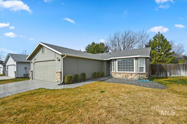 ranch-style home featuring stone siding, a front yard, an attached garage, and fence