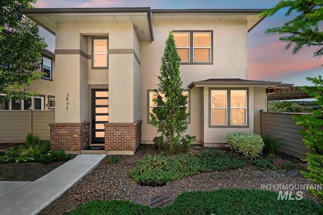 3671 S Pheasant Tail Way, Boise, ID 83716 - view of front of property with stucco siding and brick siding