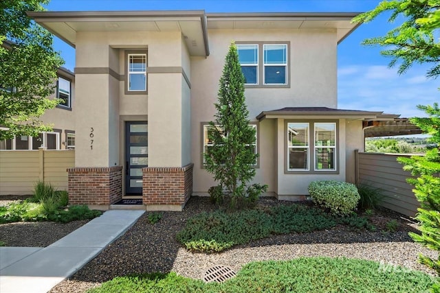 3671 S Pheasant Tail Way, Boise, ID 83716 - view of front of home with stucco siding and brick siding