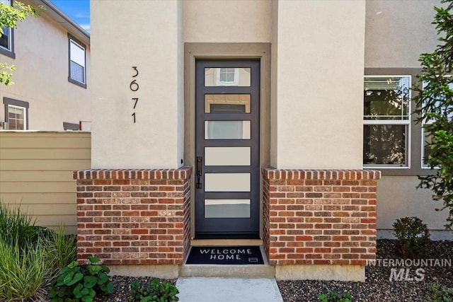 3671 S Pheasant Tail Way, Boise, ID 83716 - entrance to property featuring stucco siding and brick siding