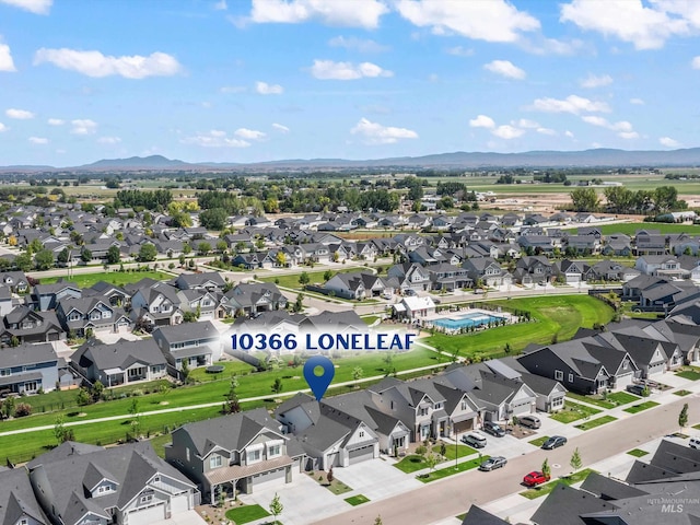 10366 Loneleaf Dr, Nampa, ID 83687 - aerial view of residential area with a mountain backdrop