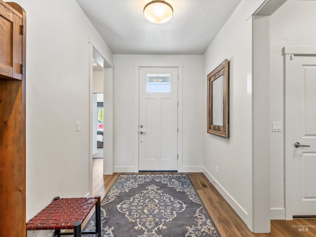 10366 Loneleaf Dr, Nampa, ID 83687 - entrance foyer featuring wood finished floors and baseboards