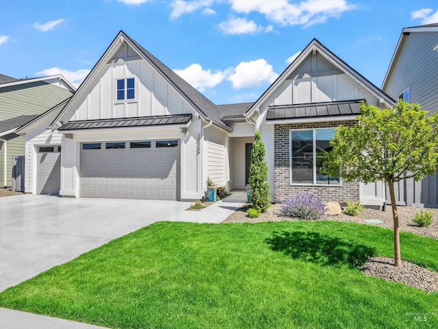 10366 Loneleaf Dr, Nampa, ID 83687 - view of front of property with board and batten siding, a standing seam roof, a garage, driveway, and a front yard