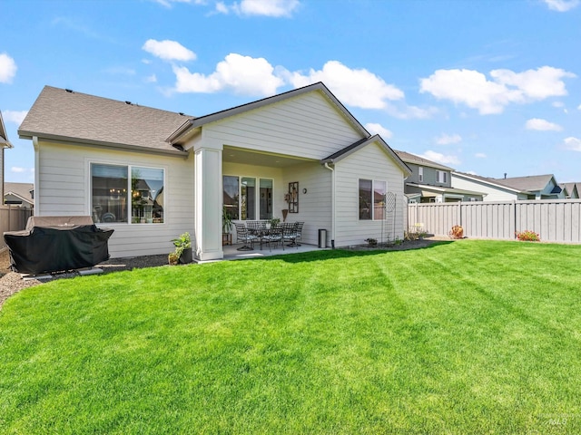 10366 Loneleaf Dr, Nampa, ID 83687 - rear view of house with a patio area