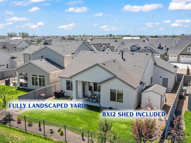 10366 Loneleaf Dr, Nampa, ID 83687 - back of property featuring a residential view and roof with shingles