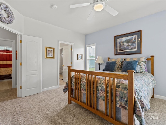 3369 W Monessen Ln, Meridian, ID 83646 - bedroom featuring light carpet, connected bathroom, and a ceiling fan