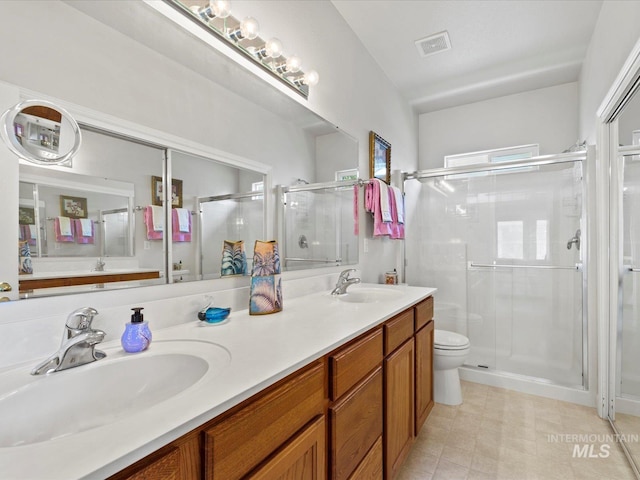 3369 W Monessen Ln, Meridian, ID 83646 - bathroom featuring a shower stall and double vanity
