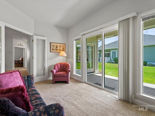 3369 W Monessen Ln, Meridian, ID 83646 - living room with carpet floors and plenty of natural light