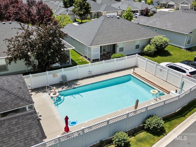 3369 W Monessen Ln, Meridian, ID 83646 - view of swimming pool featuring a fenced backyard and a residential view