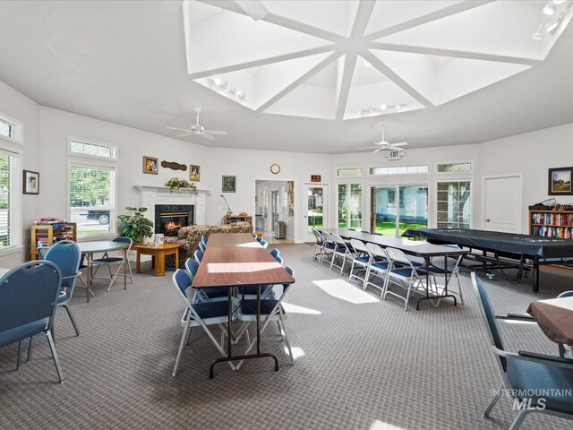 3369 W Monessen Ln, Meridian, ID 83646 - dining space with carpet floors, a high end fireplace, and ceiling fan