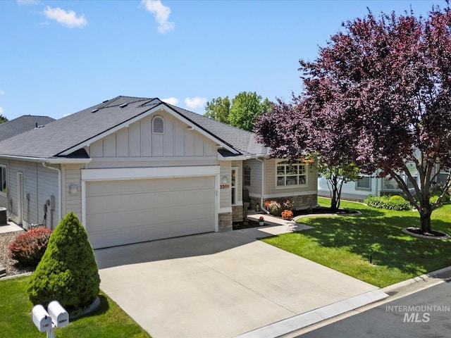 3369 W Monessen Ln, Meridian, ID 83646 - ranch-style house with an attached garage, board and batten siding, a front yard, concrete driveway, and a shingled roof
