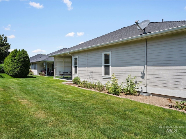 3369 W Monessen Ln, Meridian, ID 83646 - rear view of house featuring a lawn and a patio