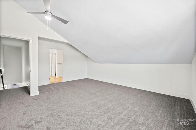 202 Broken Pne, Mccall, ID 83638 - additional living space with lofted ceiling, carpet floors, ceiling fan, and baseboards