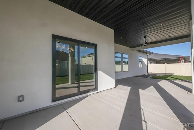 view of patio with ceiling fan