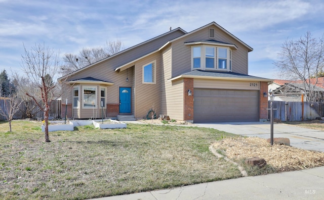 view of front of property featuring brick siding, a front lawn, fence, concrete driveway, and a garage