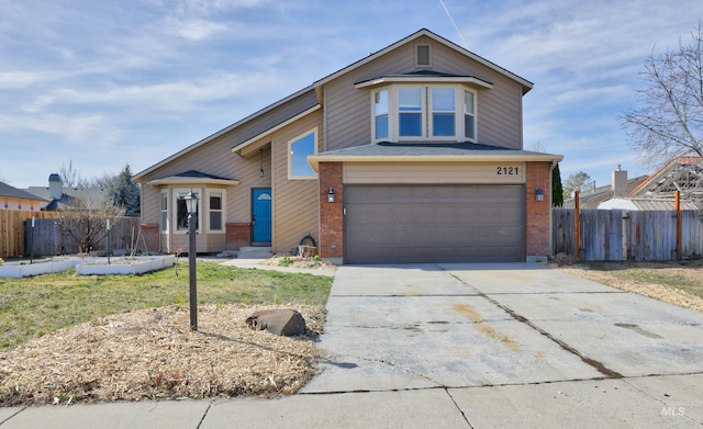 view of front of house featuring concrete driveway, an attached garage, fence, and brick siding