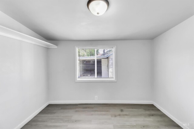 357 Filer Ave, Twin Falls, ID 83301 - spare room featuring baseboards and wood finished floors