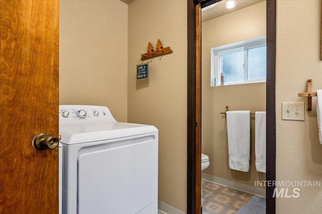 108 Panorama Dr, Cascade, ID 83611 - washroom featuring washer / clothes dryer and baseboards