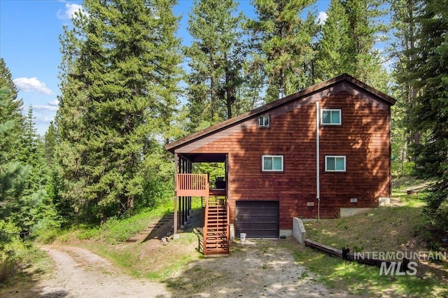 108 Panorama Dr, Cascade, ID 83611 - view of property exterior with driveway, stairway, and a garage