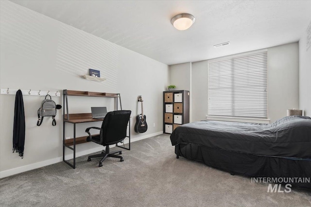 bedroom with light carpet