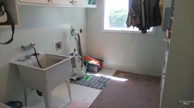 1112 W D St, Vale, OR 97918 - washroom featuring washer hookup and cabinet space