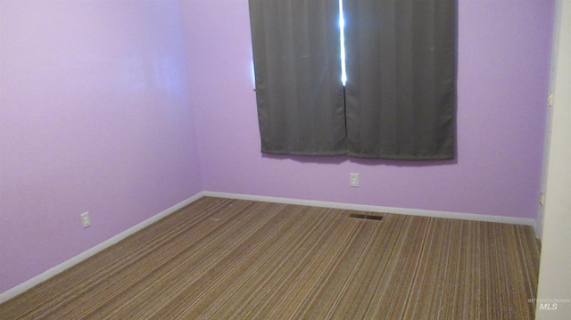 1112 W D St, Vale, OR 97918 - spare room with carpet floors and baseboards