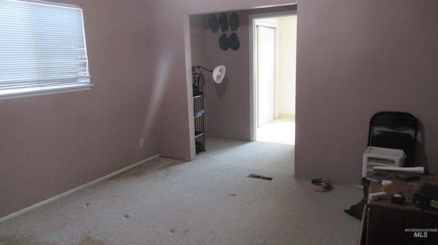 1112 W D St, Vale, OR 97918 - carpeted empty room featuring baseboards