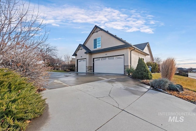 view of home's exterior with a garage