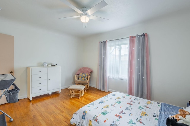 3102 N Sycamore Dr, Boise, ID 83703 - bedroom featuring light wood finished floors, a ceiling fan, and baseboards
