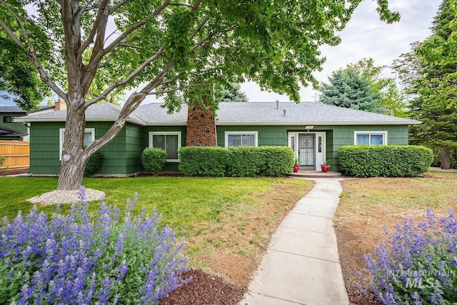 3102 N Sycamore Dr, Boise, ID 83703 - view of front of property featuring roof with shingles and a chimney