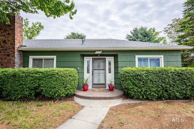 3102 N Sycamore Dr, Boise, ID 83703 - view of front facade featuring roof with shingles