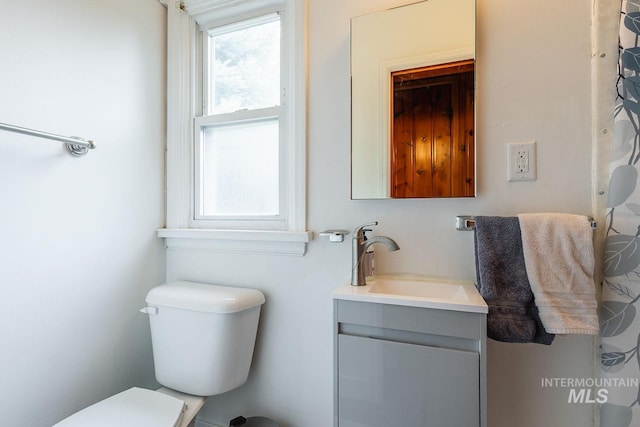 3102 N Sycamore Dr, Boise, ID 83703 - bathroom featuring healthy amount of natural light, toilet, and vanity