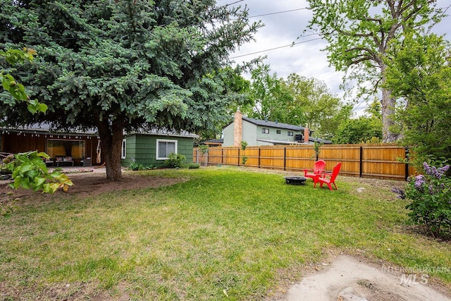 3102 N Sycamore Dr, Boise, ID 83703 - view of yard featuring an outdoor fire pit and a patio