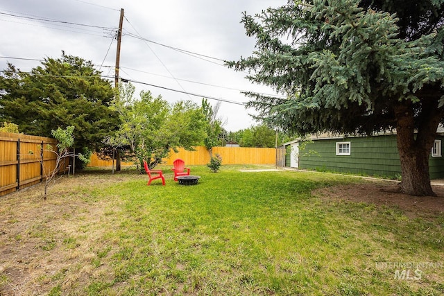 3102 N Sycamore Dr, Boise, ID 83703 - view of yard featuring an outdoor fire pit
